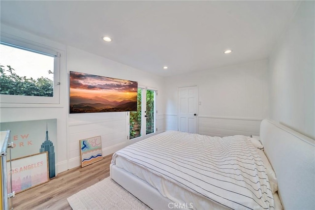 bedroom featuring recessed lighting and wood finished floors