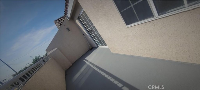 exterior details featuring stucco siding