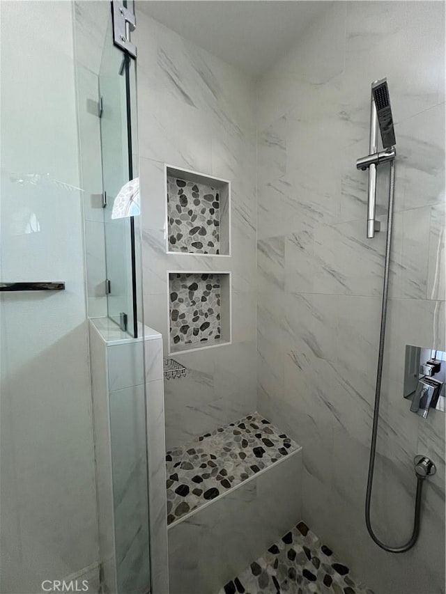 full bathroom with a stall shower