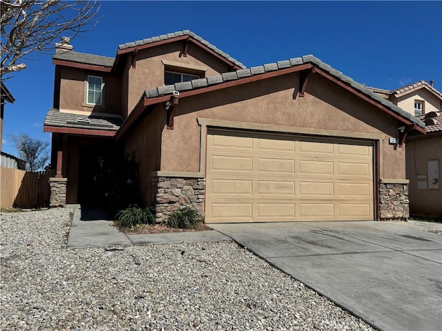 view of front facade with stone siding, concrete driveway, and stucco siding