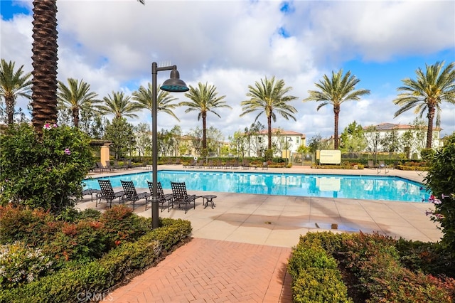 pool with a patio