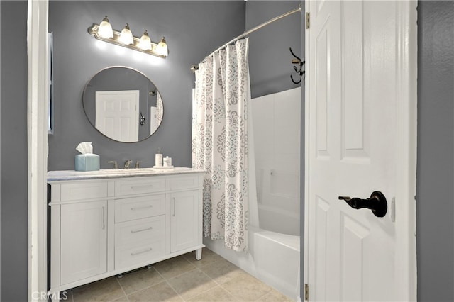 bathroom with tile patterned floors, vanity, and shower / bathtub combination with curtain