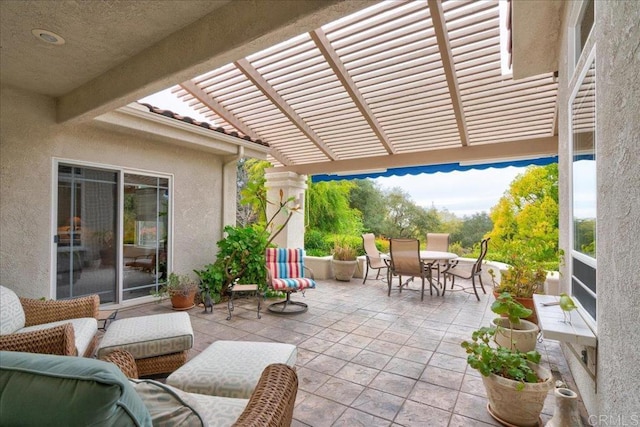 view of patio / terrace featuring outdoor dining area and a pergola