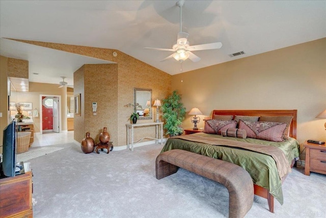 bedroom featuring carpet, visible vents, a ceiling fan, vaulted ceiling, and baseboards