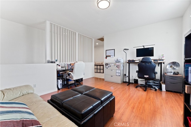 office space featuring wood finished floors