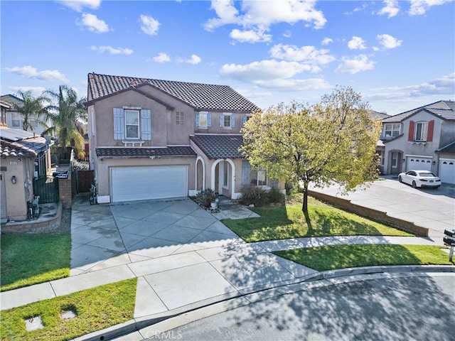 view of front facade featuring stucco siding, concrete driveway, a tile roof, and an attached garage