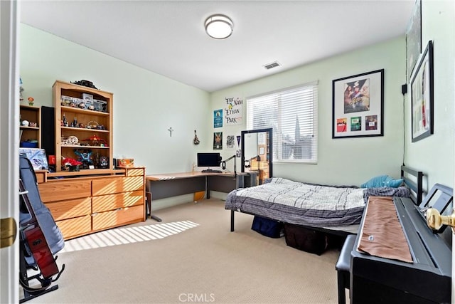 bedroom featuring visible vents and carpet flooring