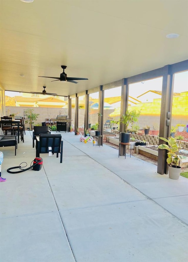 view of patio / terrace featuring a ceiling fan, outdoor dining space, and an outdoor hangout area