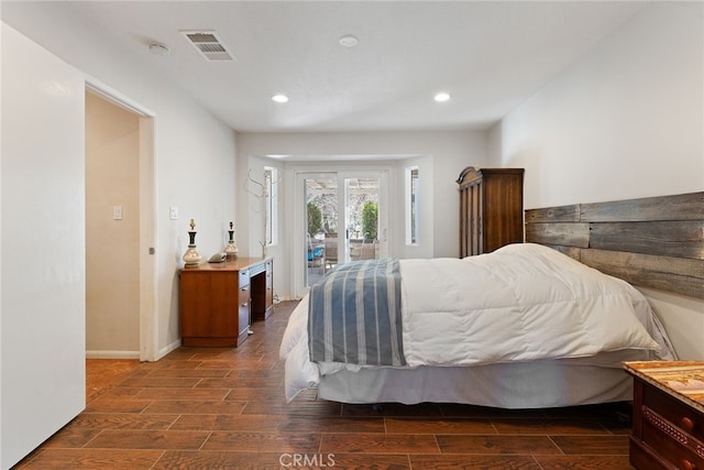 bedroom featuring access to exterior, visible vents, recessed lighting, and wood finish floors