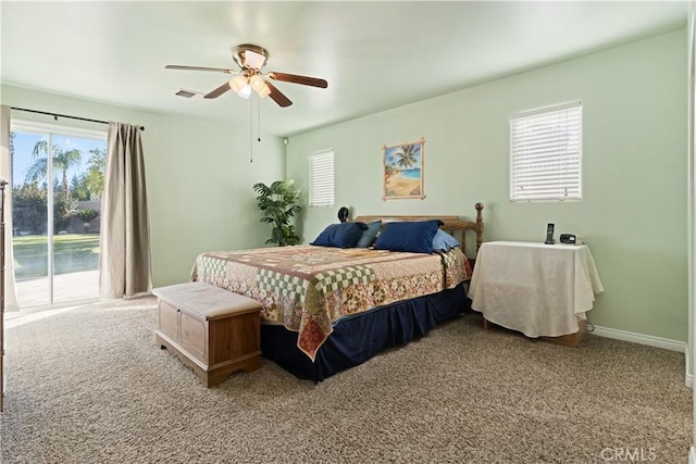 bedroom with ceiling fan, light carpet, visible vents, baseboards, and access to exterior