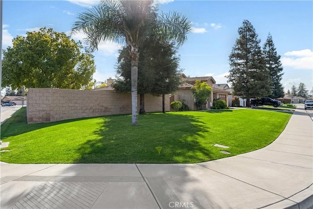 exterior space with a front lawn