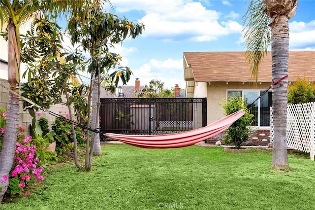 view of yard featuring fence