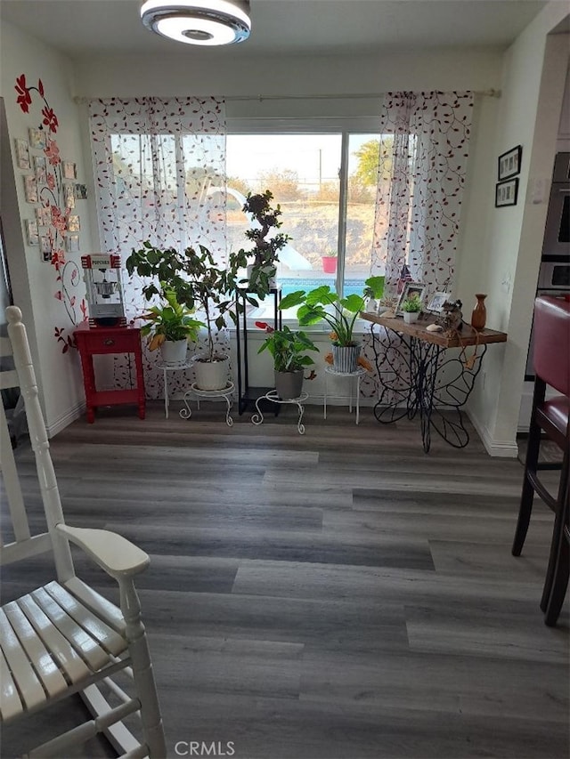 19010 Waseca Rd, Apple Valley, CA 92307 - dining space featuring wood finished floors and baseboards