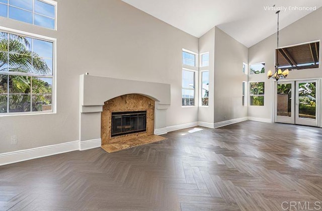 14797 Wild Colt Pl, Jamul, CA 91935 - unfurnished living room with high vaulted ceiling, baseboards, and healthy amount of natural light
