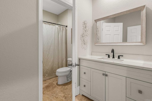 14797 Wild Colt Pl, Jamul, CA 91935 - bathroom featuring toilet, vanity, a textured wall, and a shower with shower curtain