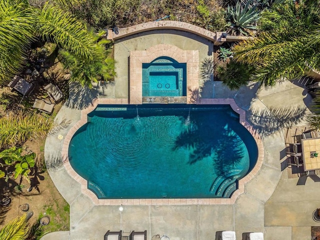 14797 Wild Colt Pl, Jamul, CA 91935 - swimming pool with a patio area