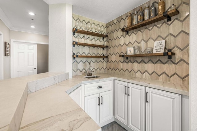 14797 Wild Colt Pl, Jamul, CA 91935 - kitchen featuring open shelves, a sink, white cabinets, ornamental molding, and recessed lighting