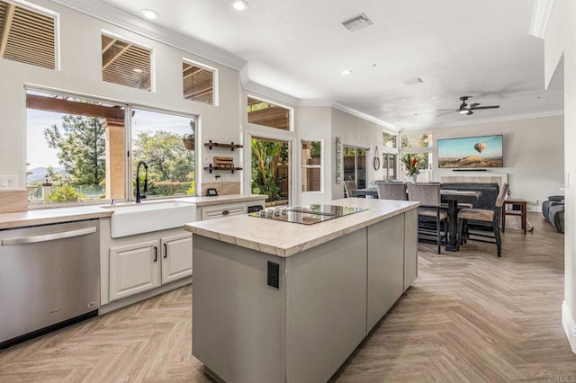 14797 Wild Colt Pl, Jamul, CA 91935 - kitchen with dishwasher, black electric cooktop, a sink, recessed lighting, and crown molding