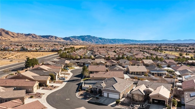 bird's eye view featuring a mountain view and a residential view