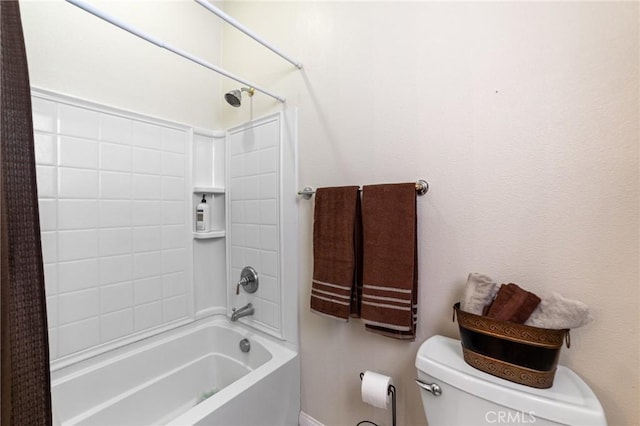 bathroom featuring toilet and shower / bathtub combination