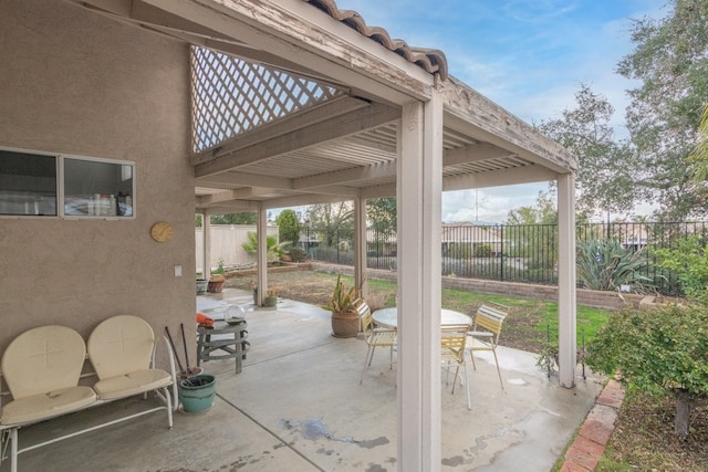 view of patio / terrace featuring a fenced backyard and a pergola