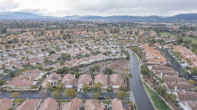 bird's eye view with a residential view and a mountain view