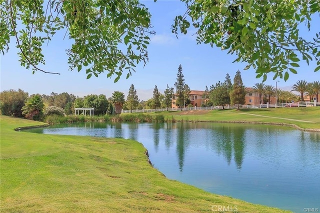 water view featuring fence