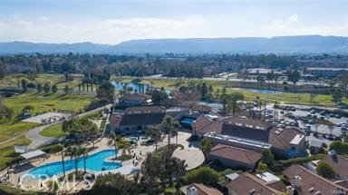 drone / aerial view featuring a mountain view