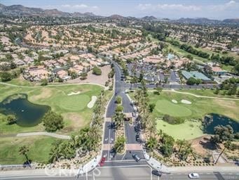 bird's eye view with view of golf course