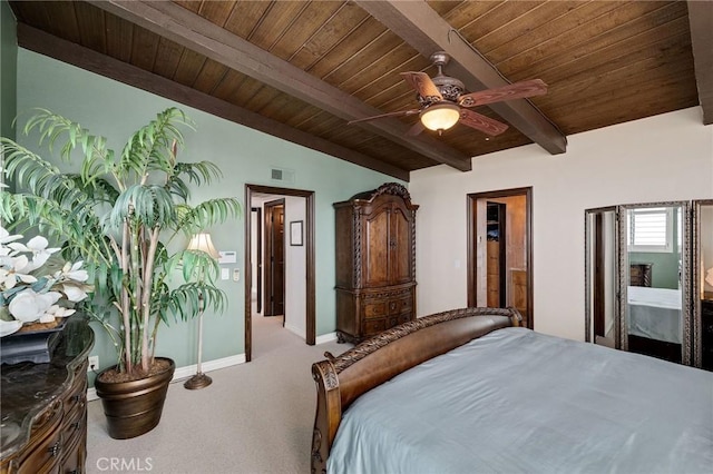 bedroom with baseboards, carpet floors, wood ceiling, and vaulted ceiling with beams