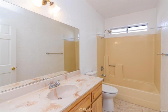 bathroom with tile patterned flooring, tub / shower combination, toilet, and vanity