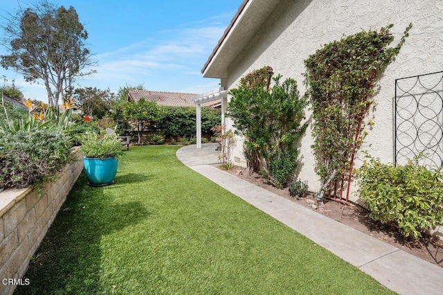 view of yard with a pergola