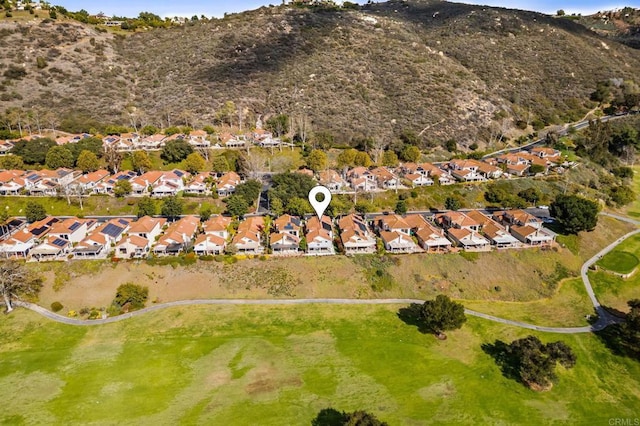 drone / aerial view with a mountain view and a residential view