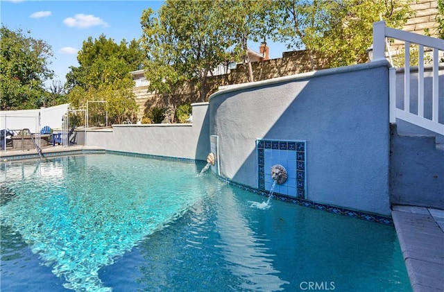 view of pool featuring fence and a fenced in pool