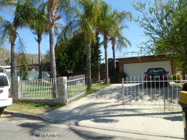 view of gate featuring a fenced front yard