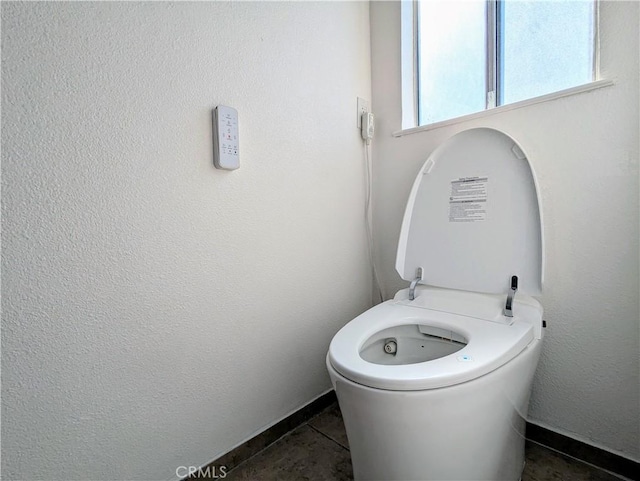 bathroom with tile patterned floors