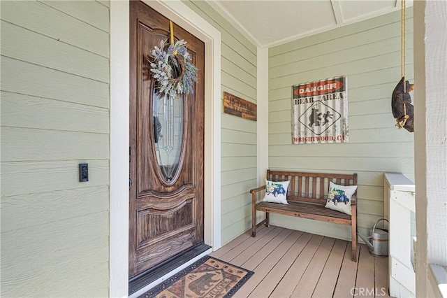entrance to property with covered porch