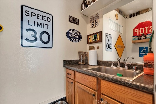 bar featuring a sink