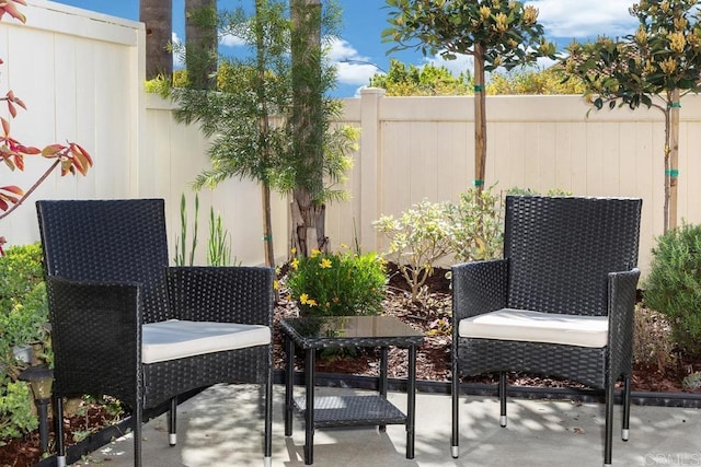 view of patio / terrace with fence