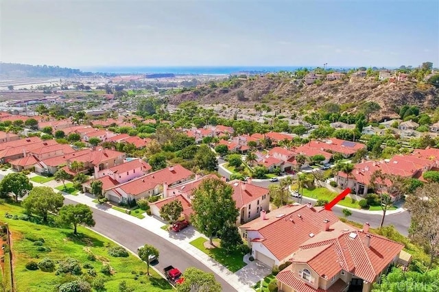 birds eye view of property with a residential view