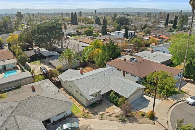 aerial view with a mountain view and a residential view