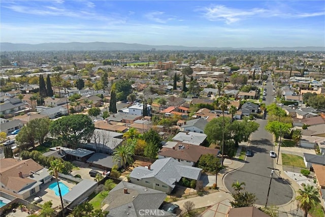 bird's eye view featuring a residential view and a mountain view