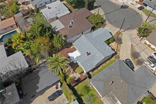 birds eye view of property with a residential view