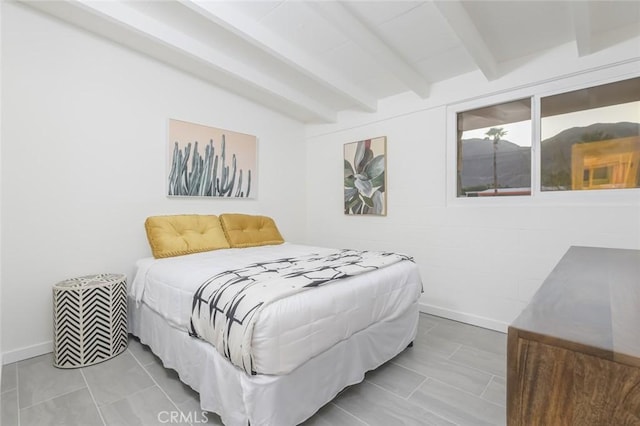 22470 Fawnridge Dr, Palm Springs, CA 92262 - bedroom featuring beamed ceiling and baseboards