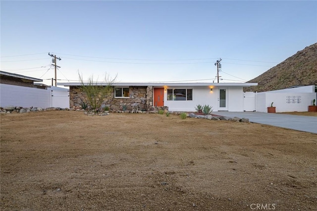 22470 Fawnridge Dr, Palm Springs, CA 92262 - single story home featuring stone siding and fence