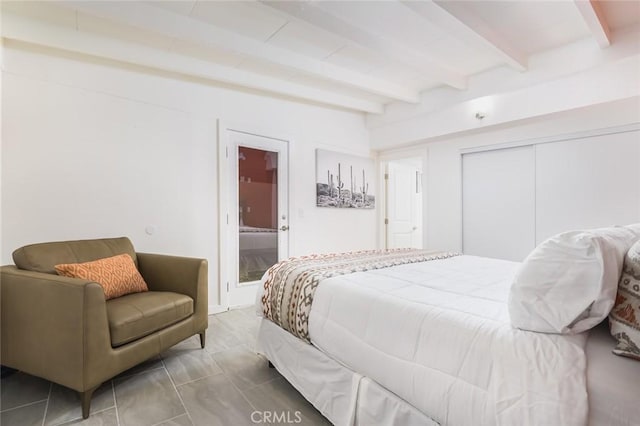 22470 Fawnridge Dr, Palm Springs, CA 92262 - bedroom featuring a closet and beam ceiling