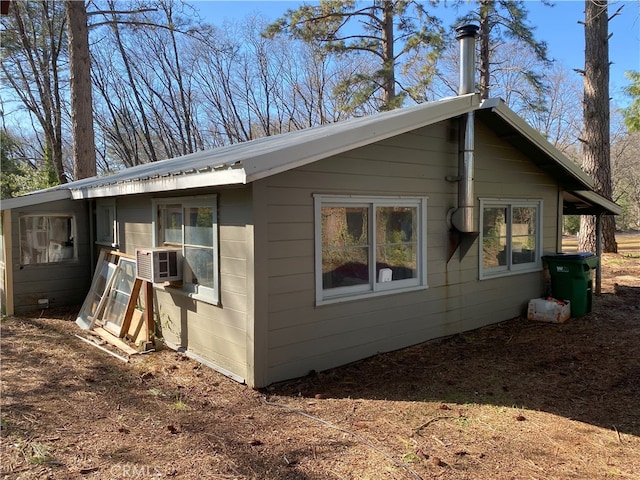 view of side of home with cooling unit