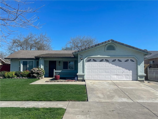 ranch-style home with stucco siding, fence, a garage, driveway, and a front lawn