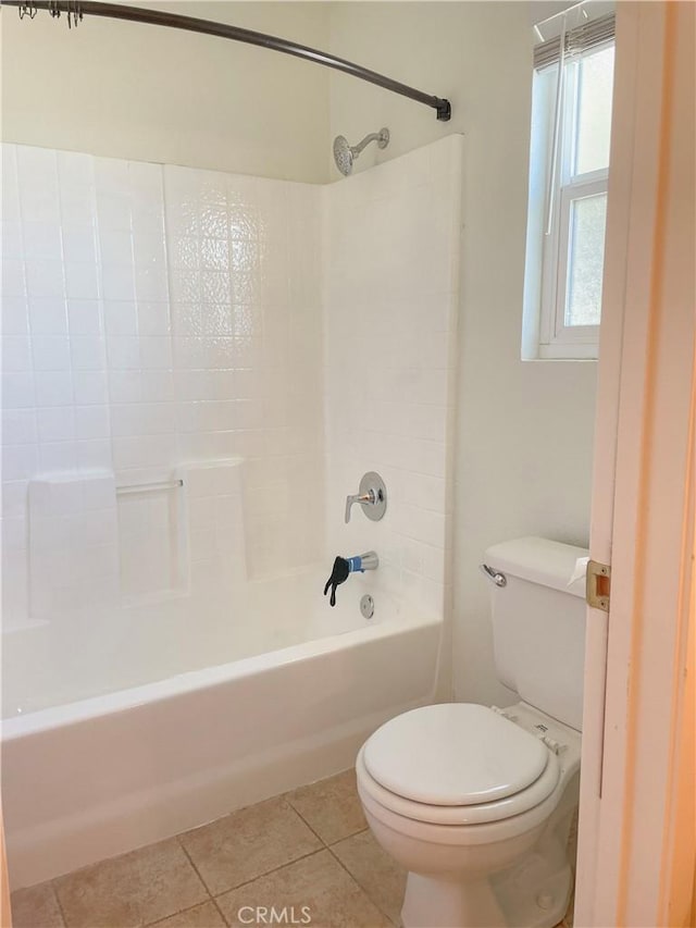 full bathroom with toilet, shower / bathing tub combination, and tile patterned floors