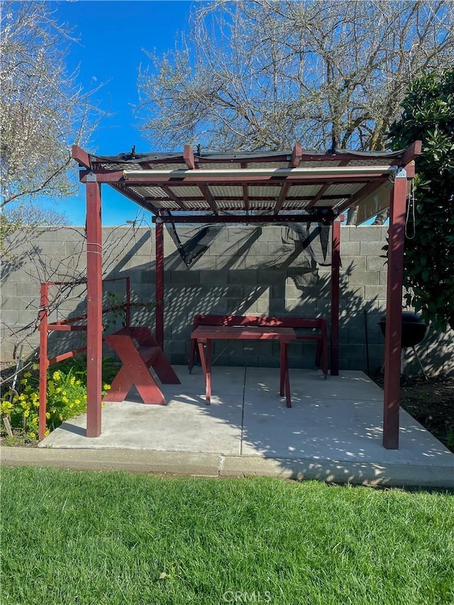 view of property's community with fence